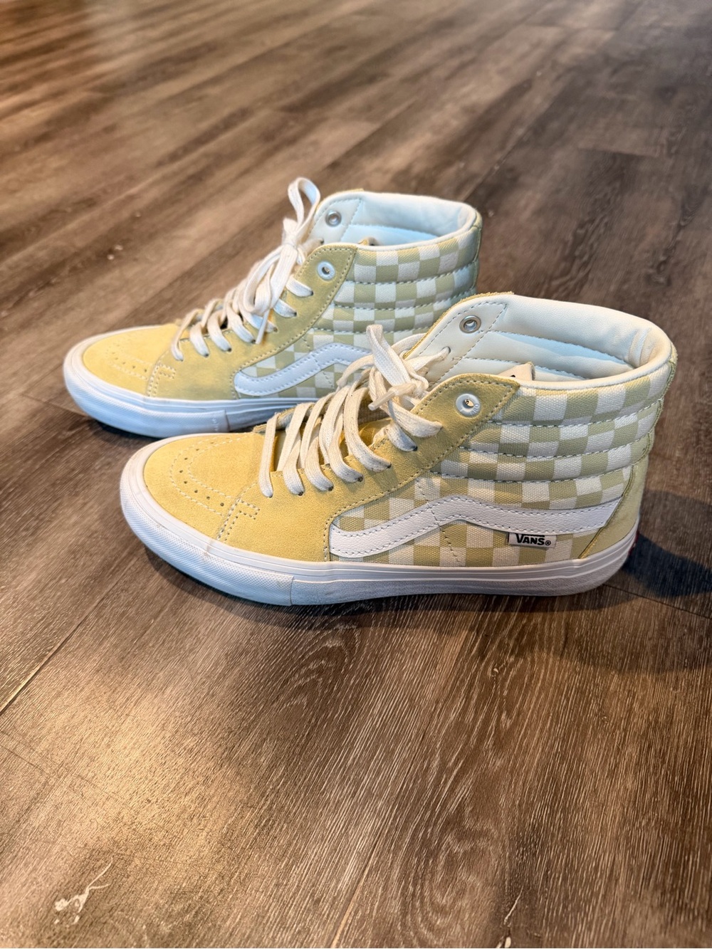 Vans High-Top Checkerboard Sneakers in Pale Yellow